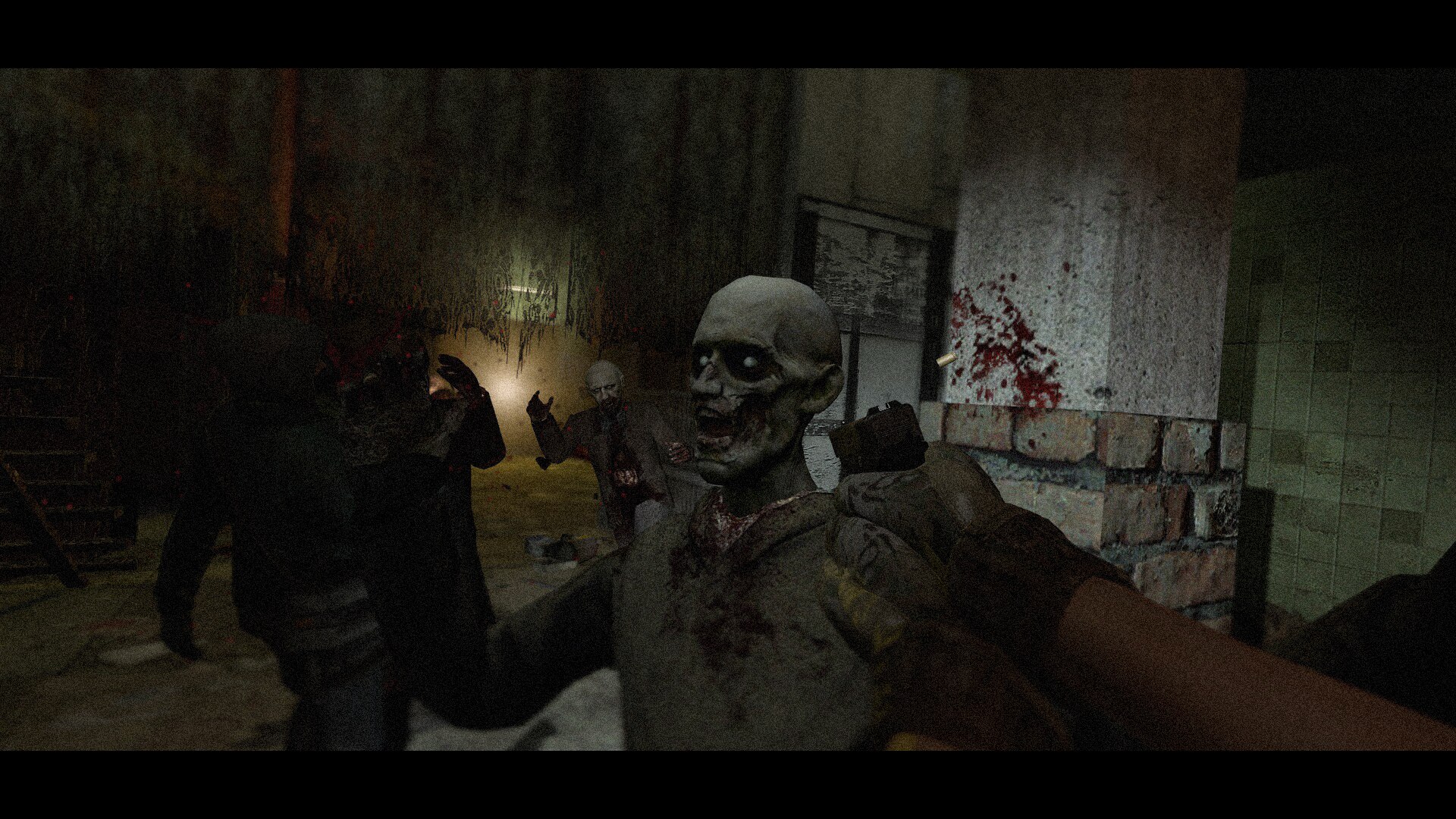 First-person melee fight against zombies in a blood-stained tiled room lit by a flashlight